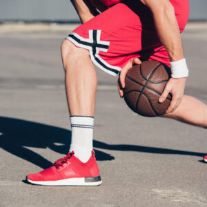 cropped-image-of-basketball-player-playing-basketb-2022-12-16-20-45-01-utc-3 Wilson NBA Authentic Series Indoor/Outdoor Basketball - Brown, Size 7-29.5"